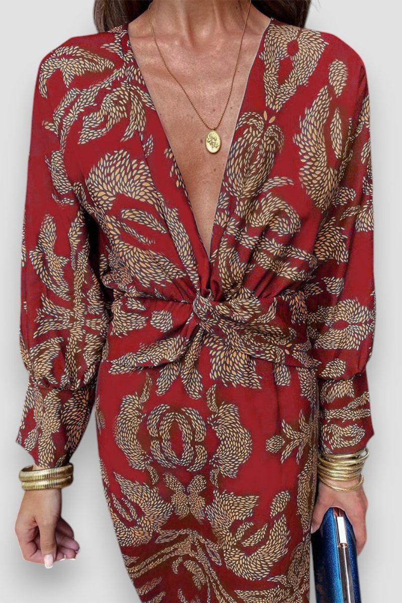 Elegante midi-jurk met twist-detail en bloemenpatroon – Tijdloos en stijlvol